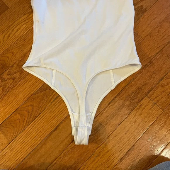 Out from under
Body suit - Picture 3 of 5